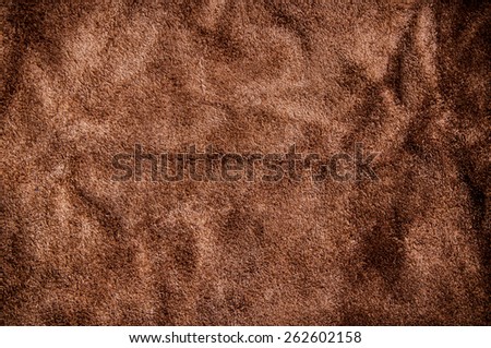 Brown Suede Leather for Concept and Idea Style of Fine Leather Crafting, Handcrafts Workspace, Handmade or Handcrafted Leather Worker. Background Textured and Wallpaper. Vintage Rustic.