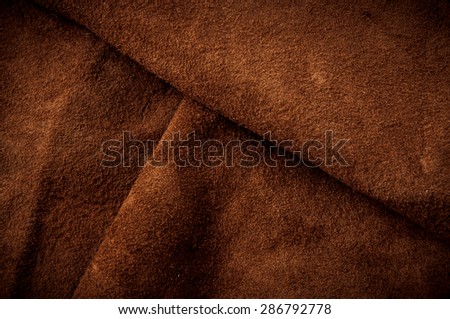 Brown Leather Cut for Concept and Idea Style of Fine Leather Crafting, Handcrafts Workspace, Handmade or Handcrafted Leather Worker. Background Textured and Wallpaper. Vintage Rustic.