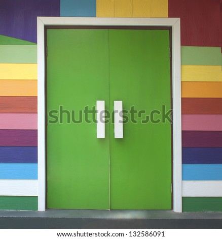 Colorful shera wooden door of the wood-paneled walls.