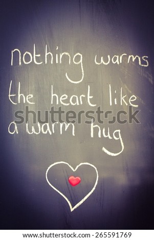 Nothing warms the heart like a warm hug written on a chalk board