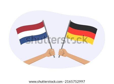 Germany and Netherlands flags. Dutch and German national symbols. Hand holding waving flag. Vector illustration.