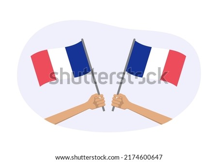 France waving flag icon or badge. Hand holding French flags. Vector illustration.