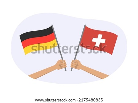 Germany and Switzerland flags. Canadian and Swiss national symbols. Hand holding waving flag. Vector illustration.