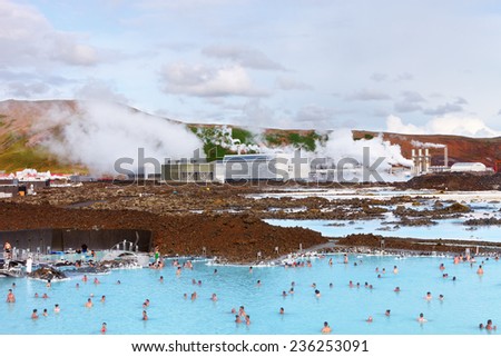 Blue Lagoon, Iceland - August 02, 2014: People bathing in The Blue Lagoon, a geothermal bath resort in the south of Iceland, a \'must see\' by tourists, near Reykjavik. August 02, 2014 in Iceland.