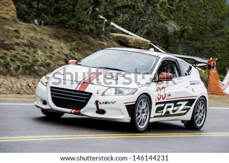 COLORADO SPRINGS, CO - JUNE 30: Sage Marie #33 drives a Honda CRZ to 3rd place in the Exhibition Class at the 2013 Pikes Peak International Hill Climb on June 30, 2013 in Colorado Springs.