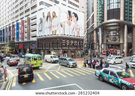 Hong Kong, Hong Kong - April 17 2015: Cars and buses find their way in the crowded traffic around the shopping district of Causeway Bay in Hong Kong island