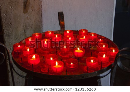 Votive candles in church