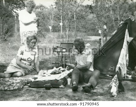 Vintage photo of family camping (sixties)