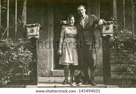 Vintage photo of couple on  porch, forties