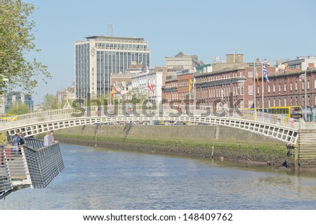 DUBLIN, IRELAND - JUNE 7: Ha\'penny Bridge, River Liffey, Dublin, Ireland on June 7, 2013