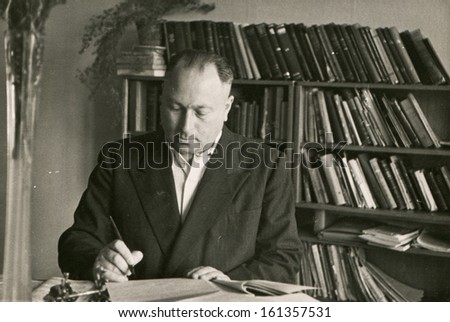 Vintage photo of man in his office (fifties)
