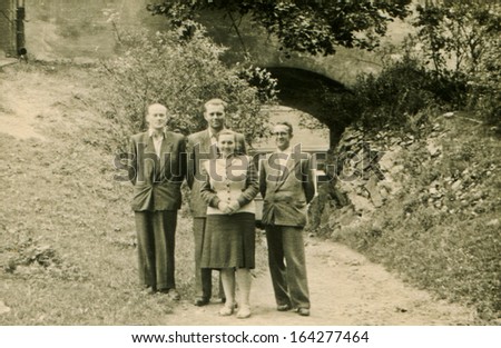 LODZ, POLAND - CIRCA FIFTIES: vintage photo of unidentified family, Lodz, Poland, circa fifties