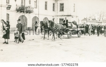 POLAND, CIRCA FORTIES - Vintage photo of funeral procession with a horse drawn hearse