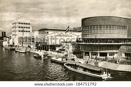 PARIS, FRANCE - CIRCA 1937: Vintage photo of Belgium, Switzerland and Italy pavilions during the International Exposition dedicated to Art and Technology in Modern Life