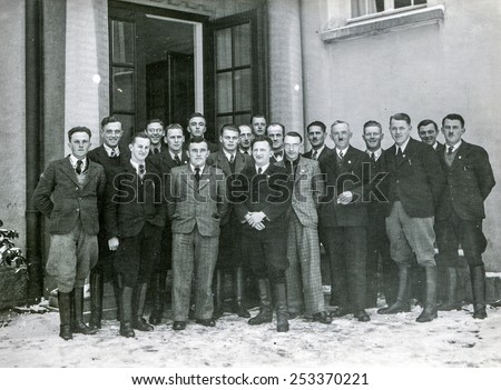 BERLIN, GERMANY, CIRCA 1930's: Vintage photo of group of men in front of building
