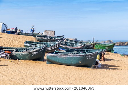 OUALIDIA, MOROCCO, APRIL 6, 2015: Fishermen prepare their boats to go fishing