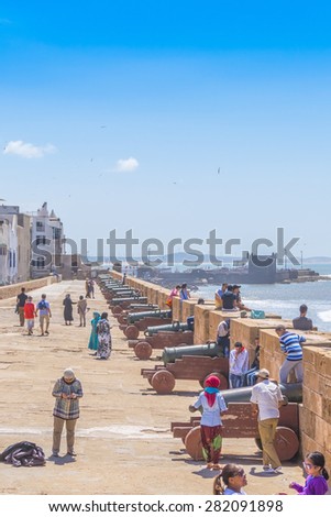 AS-SAWIRA, MOROCCO, APRIL 7, 2015:  Local people and tourists walk on ramparts of Skala de la Ville