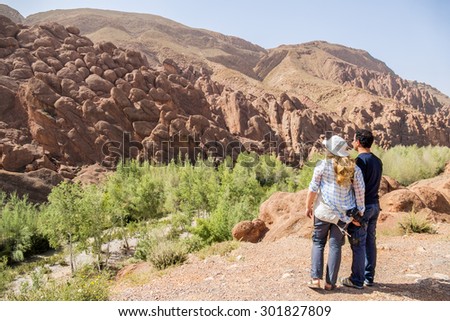 Inter ethnic couple of tourists in Dades Gorges, Morocco