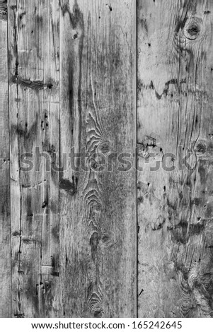 Grungy black and white wooden panel background