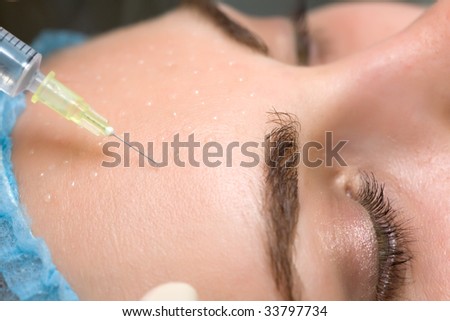 cosmetic injection to the pretty female face