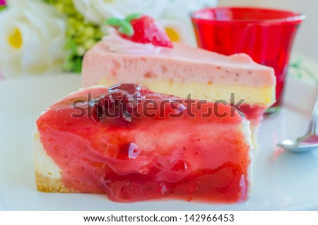 Strawberry cheese cake on white dish