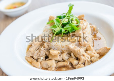 Chicken with brown sauce on rice