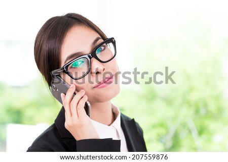 Business woman talking cellphone