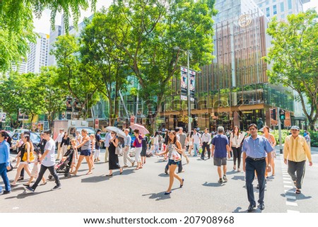 SINGAPORE-JUNE 26:Aerial view of sidewalk of Orchard road in Singapore on JUNE 26, 2014. Orchard road is one of best shopping district in Singapore.