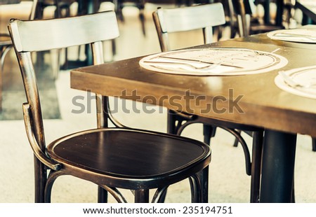 Selective chairs in restaurant - vintage effect pictures