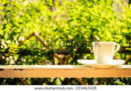Outdoor Coffee cup with sun light - vintage effect process style pictures