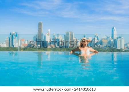 Similar – Image, Stock Photo Young beautiful tall woman in black bikini in shallow water in Baltic Sea