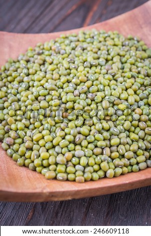 Mung beans on wooden background - vintage effect style pictures