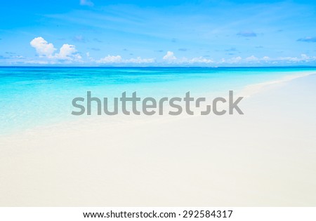 Beautiful tropical beach and sea with blue sky background