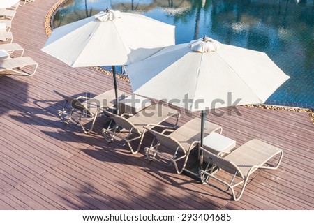 Pool chair with umbrella