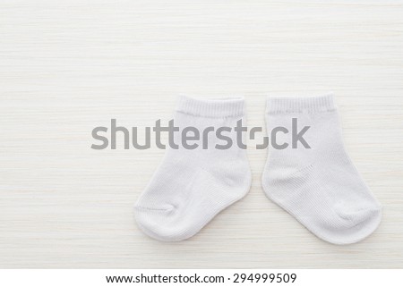 Socks on wood background
