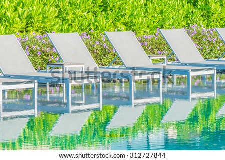 Pool chair in hotel pool resort
