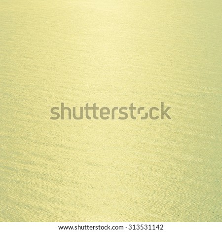 Vintage sea water background with sunflare light from sun - Vintage filter effect