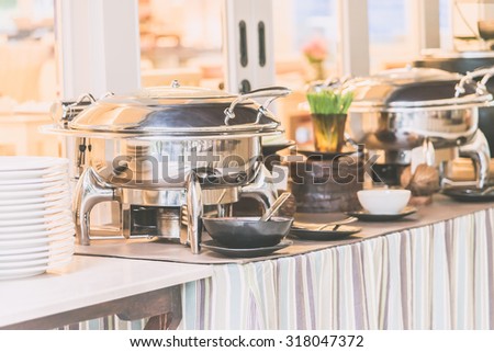 Selective focus point on Catering buffet food in restaurant - Light vintage filter effect