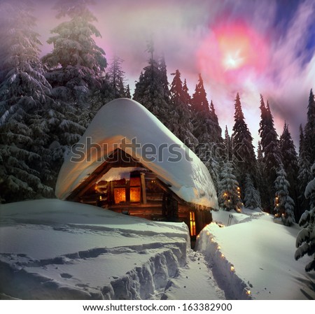 Climbing to tourist wild alpine mountain to an abandoned cabin-in order to illuminate the snow-covered spruce canopy during moonrise, moonset, to see the first star of Christmas in the Carpathians