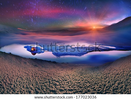 Tourists spend the night on the ice mountain lake Vorozheska for the experience. Sunrise and sunset illuminates the incredible colors of the extreme winter landscape overnight tourists brave climbers