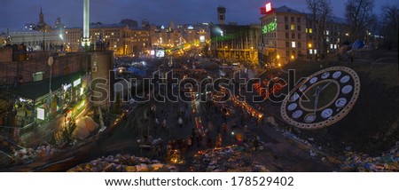 Kiev, Ukraine - February 24, 2014: Freed from government troops Evromaydan. Residents of the city bring flowers and light candles in memory of the fallen defenders of the capital
