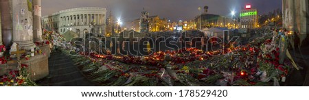 Kiev, Ukraine - February 24, 2014: Freed from government troops Evromaydan. Residents of the city bring flowers and light candles in memory of the fallen defenders of the capital