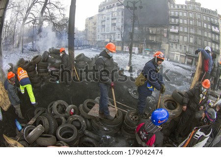 Kiev, Ukraine - January 26, 2014: The barricades on the street were built Hrushevskoho defenders of democracy to stop the advance of  special forces remained loyal to President Yanukovych-squad Berkut