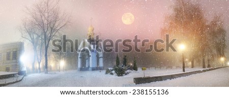 Blizzard and rain enveloped Kiev, bad weather a bad review  a romantic mood in the old St. Michael\'s Cathedral on the background of the ancient walls of the monastery and bashen- trees park and garden