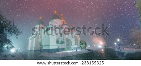 Blizzard and rain enveloped Kiev, bad weather a bad review - a romantic mood in the ancient St. Sophia Cathedral, on the background of the ancient walls and trees bashen- monastic park and garden,