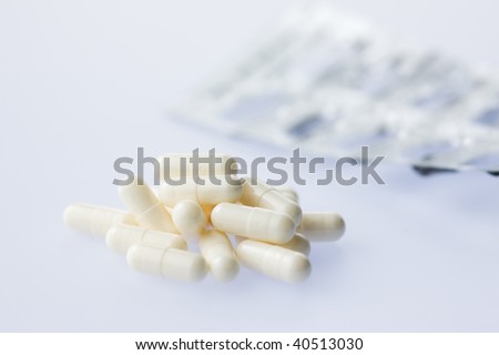 Capsule of medicine and empty package.