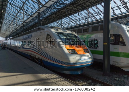 HELSINKI - APRIL 19: Allegro train (Saint Petersburg, Russia - Helsinki, Finland) on April 19, 2014. Allegro first high-speed train from Russia to Europe.