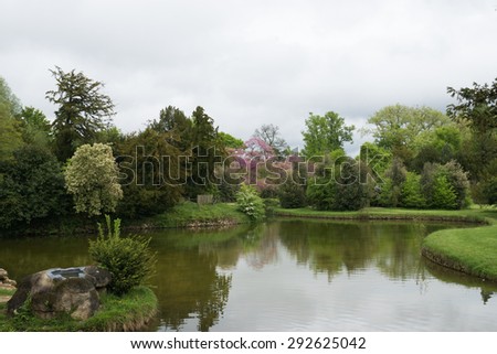 Spring Park. Lake in the spring park. Spring landscape.