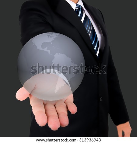 Businessman holds Earth in a hand , Elements of this image furnished by NASA