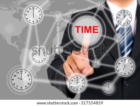 Businessman pushing on a touch screen interface on Time button